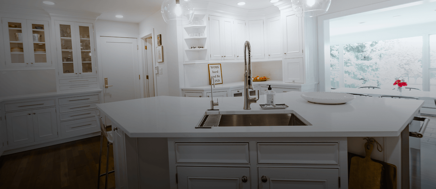 Custom white quartz kitchen countertop with undermount sink in Denver home