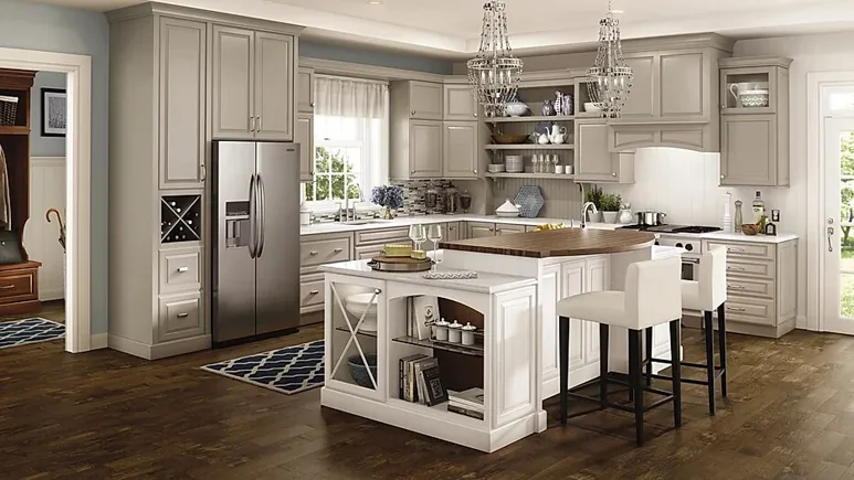 Traditional kitchen with a center island, bar stools and a chandelier